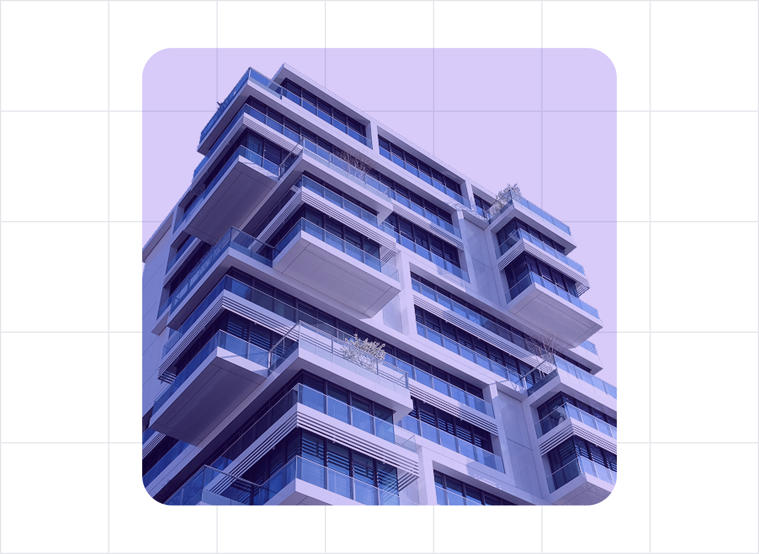 Low-angle view of a modern multi-story apartment building with glass balconies against a clear blue sky.